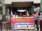 CEGAH TINDAK KEJAHATAN PREMANISME, POLSEK PANGKALAN KURAS SOSIALISASI SABER PUNGLI SECARA RUTIN KEPADA PENGURUS PASAR BARU SOREK