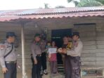 Kapolsek Bunut AKP Daniel Selamat Nainggolan S,IP Serahkan Bantuan Kepada Warga Kurang Mampu.
