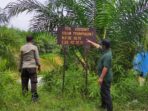 Lakukan Pencegahan Dini Terhadap Karhutla, Personel Polsek Langgam Cek Ketersediaan Air Embung dan Kanal Bloking.